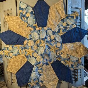 Starburst pattern blue sea shells cotton table topper